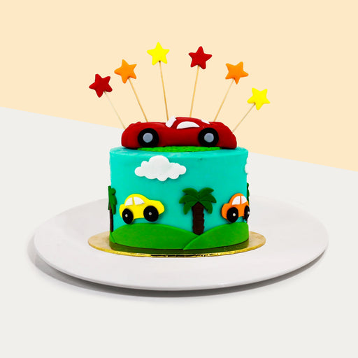 Toy car themed cake, with a 3d fondant cake model on top