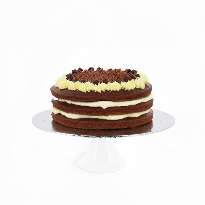 Chocolate cake with caramel filling along with cream cheese frosting