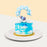 Gender reveal baby boy cake with an elephant figurine