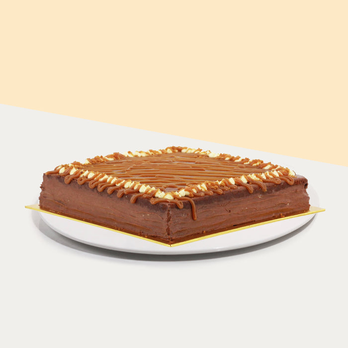 Chocolate cake drizzled with rich caramel sauce