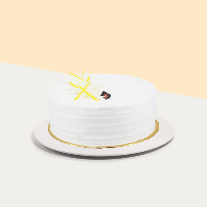 Japanese sponge cake with fresh vanilla cream, mango and coconut mousse