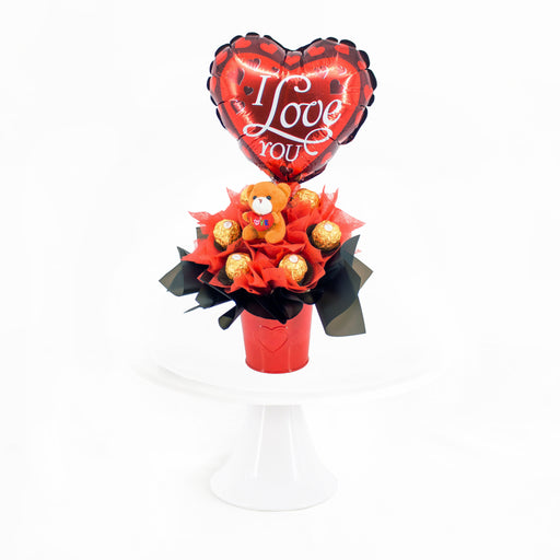 Ferrero Rocher bouquet with a teddy bear and red foil balloon