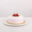 Sponge cake with strawberry jelly pudding, topped with fresh cream and strawberries