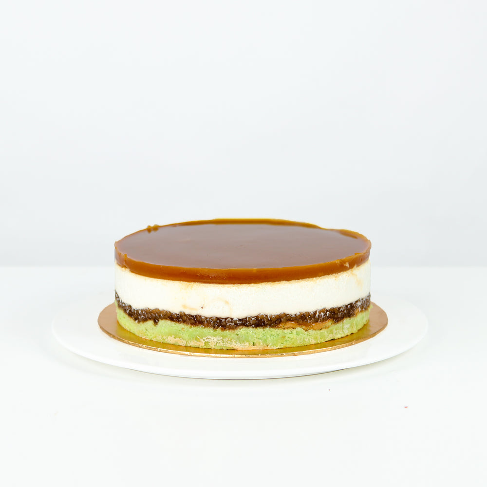 Cendol cake with layers consisting of cendol, sago, gula melaka, coconut milk and gula melaka gelatine