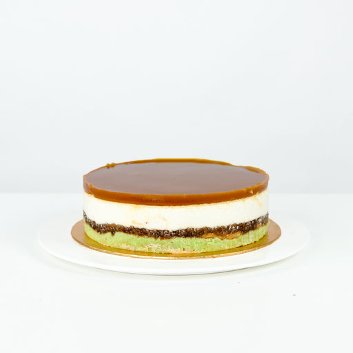 Cendol cake with layers consisting of cendol, sago, gula melaka, coconut milk and gula melaka gelatine