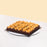 Chocolate cake bites with salted caramel cream, coated with salted caramel drizzle