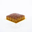 Coffee cake embedded with walnuts, glazed in caramel sauce