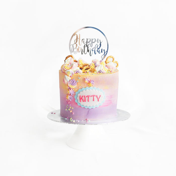 Pink and orange ombre buttercream cake