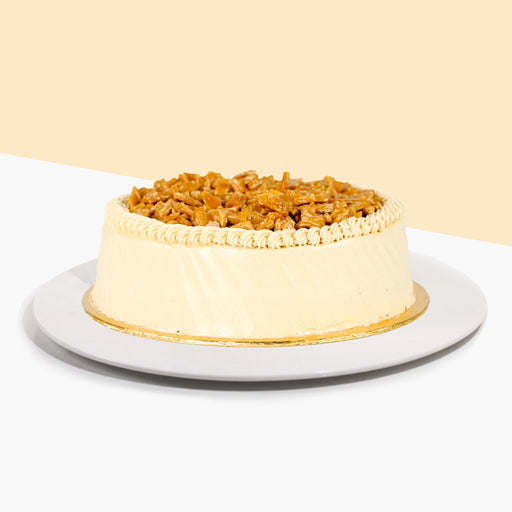 Gula Melaka cake with caramelized banana topped with caramelized nuts