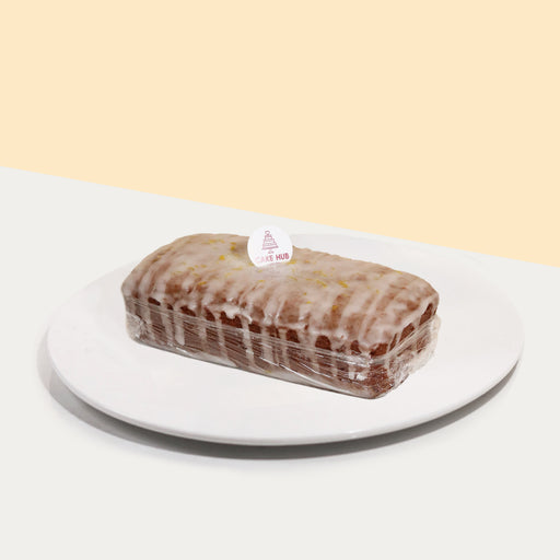 Lemon vegan loaf cake, topped with lemon glaze
