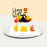 Construction themed cake, with construction vehicles, traffic cones and a stop sign.