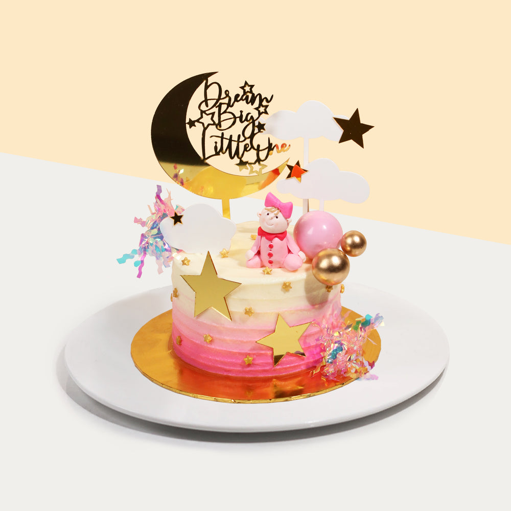Pink butter cake designed with baby girl elements