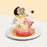 Pink butter cake designed with baby girl elements