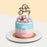 Gender reveal cake with geometric bear figurine