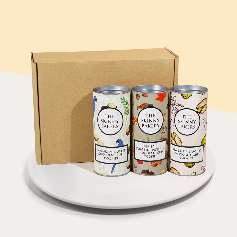 Bundle of three cookies of macadamia white chocolate chip, sea salt hazelnut chocolate, and sea salt pistachio chocolate