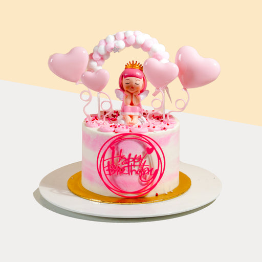 Princess themed pink buttercream butter cake, with a princess figurine and pink heart decorations