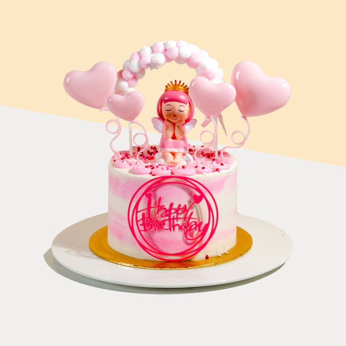 Princess themed pink buttercream butter cake, with a princess figurine and pink heart decorations