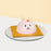 Half sphere cake decorated to look like a bunny, filled with soft sponge cake with a three flavours to choose from