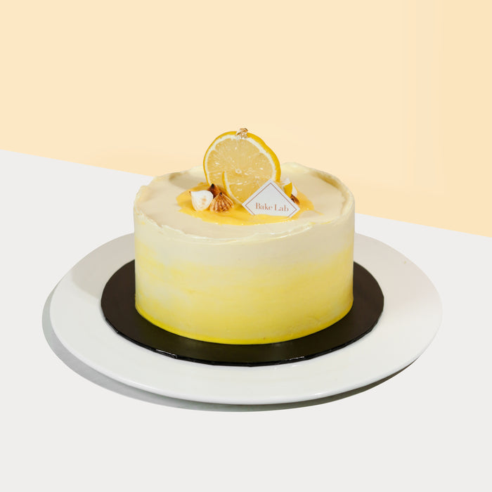 Buttery lemon cake with lemon curd filling, frosted in buttercream