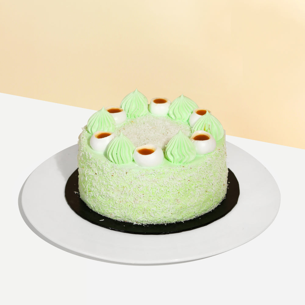 Pandan sponge cake with desiccated coconut and Gula Melaka
