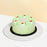 Pandan sponge cake with desiccated coconut and Gula Melaka