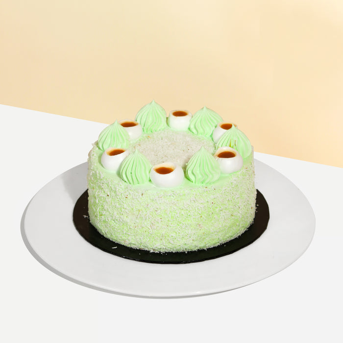 Pandan sponge cake with desiccated coconut and Gula Melaka