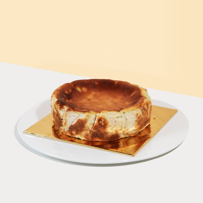 Burnt cheesecake with cendol chunks and coconut milk