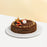 Hazelnut chocolate mille crepe, topped with crushed nuts and fresh fruit