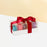 Macaron box with 5 pieces of macarons, in a see through box tied with a red ribbon