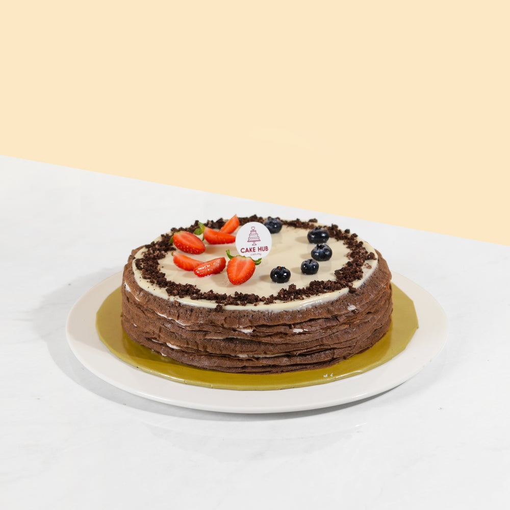 Dark chocolate crepes with milk buttercream and Oreo chunks