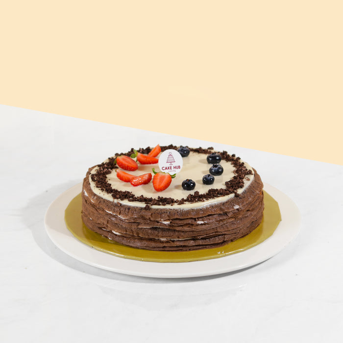 Dark chocolate crepes with milk buttercream and Oreo chunks
