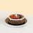 Mille crepe with peanut cream layers, topped with chocolate ganache and peanut crumbs