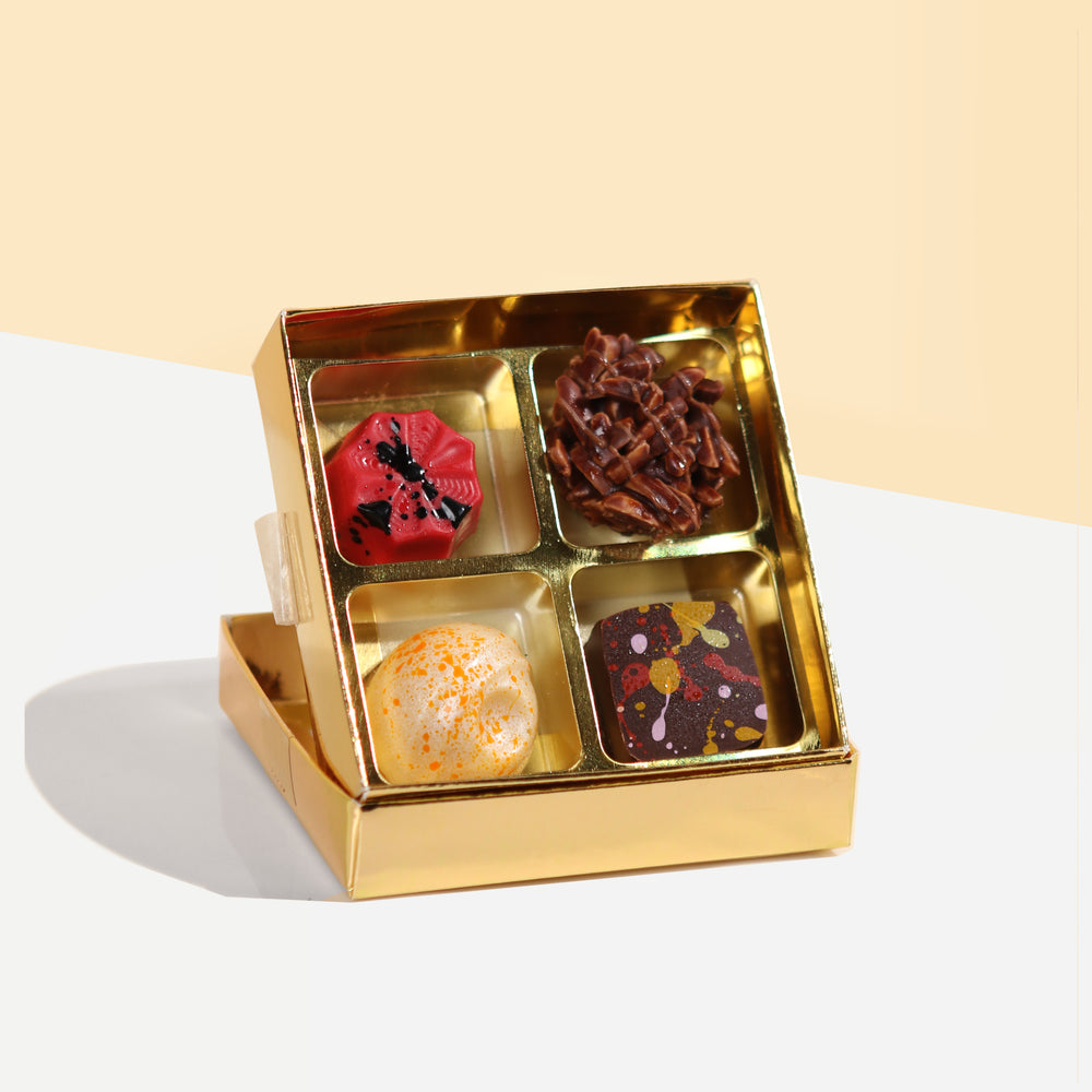 Four pieces of mini chocolate pralines