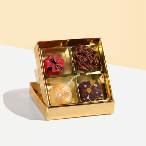 Four pieces of mini chocolate pralines