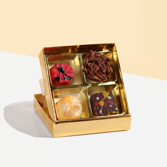 Four pieces of mini chocolate pralines