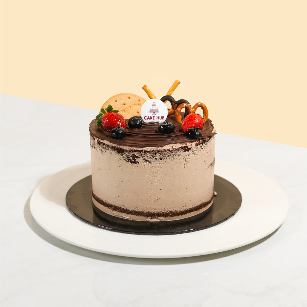Vegan Belgian chocolate cake, topped with fresh fruits