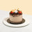 Vegan Belgian chocolate cake, topped with fresh fruits