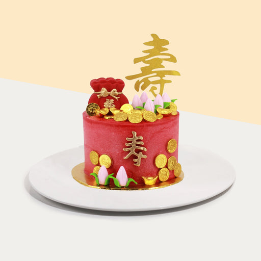 Longevity prosperity cake in red buttercream
