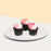 Chocolate cupcakes with white chocolate ganache, pink icing, peanut nibs and Andes mint candy