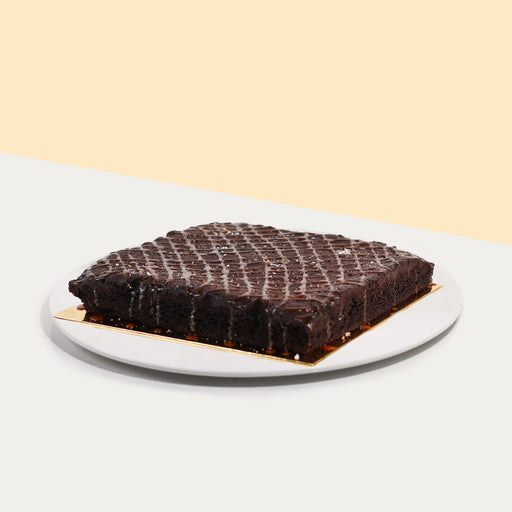 Square piece of salted caramel brownies